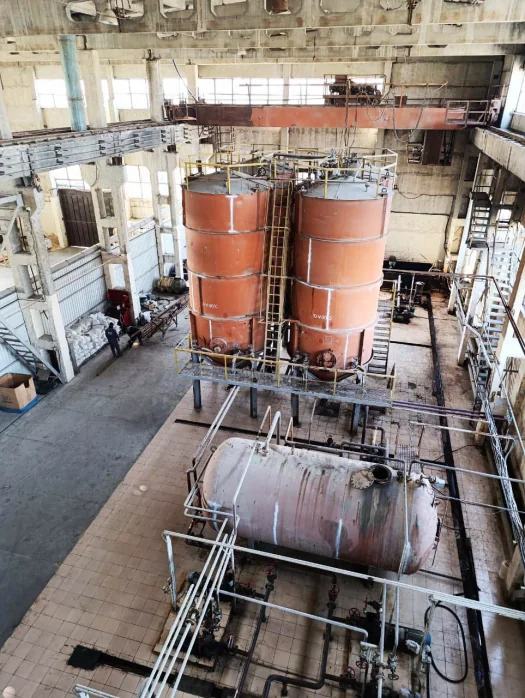Elevated view across processing vessels and pipework